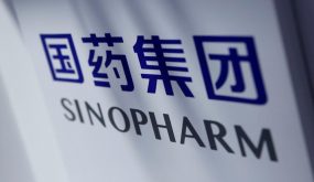 FILE PHOTO: A Sinopharm sign is seen at the 2020 China International Fair for Trade in Services (CIFTIS) in Beijing, China, September 5, 2020. REUTERS/Tingshu Wang/File Photo/File Photo