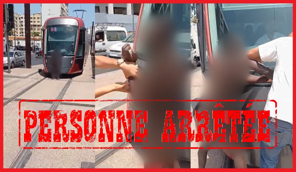 هكذا تفاعل الأمن مع عرقلة إفريقي عاري الجسد حركة سير الترام بالبيضاء